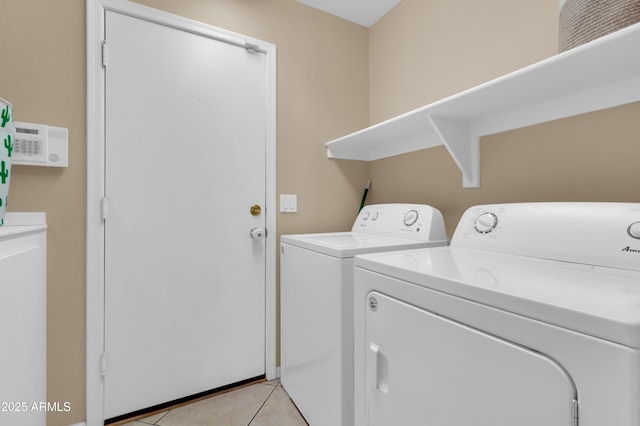 925 W San Marcos Dr, Chandler, AZ 85225 - laundry room with independent washer and dryer and light tile patterned flooring