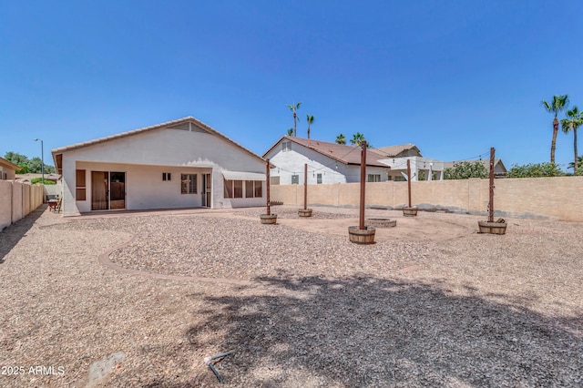 925 W San Marcos Dr, Chandler, AZ 85225 - back of house with a fenced backyard, stucco siding, and a patio area