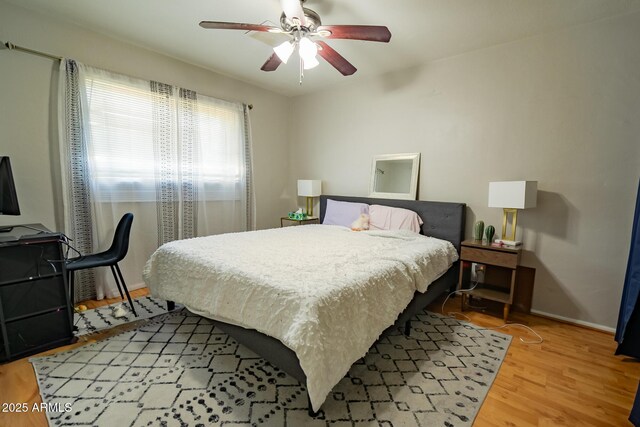 1412 W 7th Pl, Tempe, AZ 85281 - bedroom with light wood-type flooring and a ceiling fan