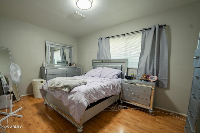 1412 W 7th Pl, Tempe, AZ 85281 - bedroom with light wood finished floors