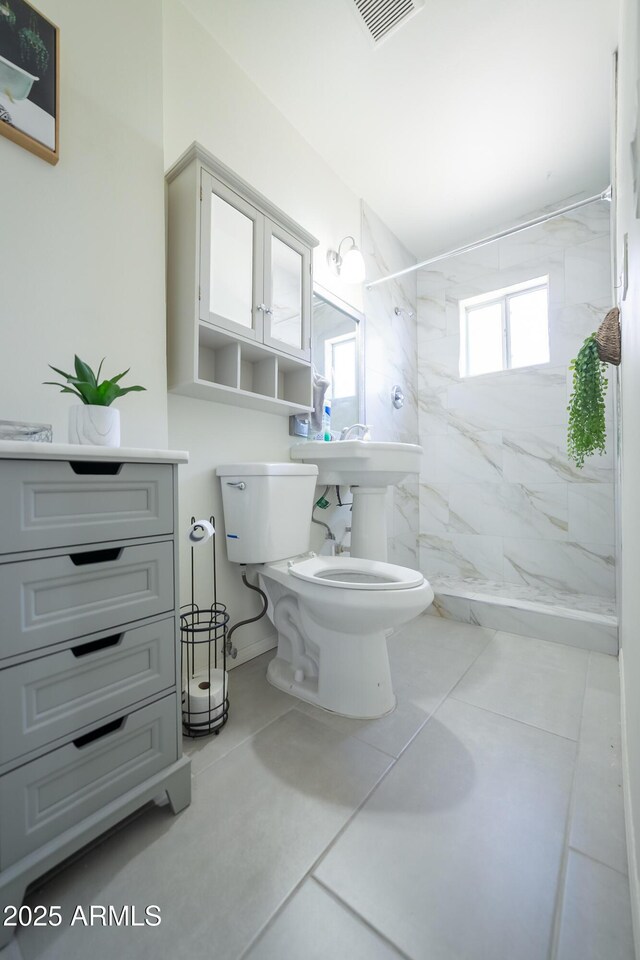 1412 W 7th Pl, Tempe, AZ 85281 - bathroom featuring a marble finish shower and tile patterned floors