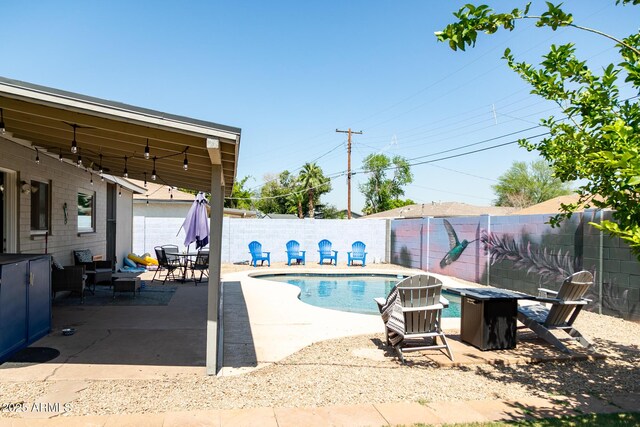 1412 W 7th Pl, Tempe, AZ 85281 - view of swimming pool featuring a patio area, an outdoor fire pit, a fenced backyard, and outdoor dining space