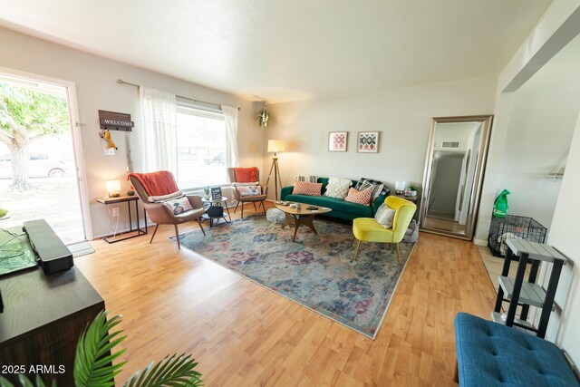 1412 W 7th Pl, Tempe, AZ 85281 - living area featuring plenty of natural light and wood finished floors