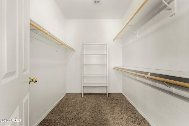 12814 W Indianola Ave, Avondale, AZ 85392 - walk in closet with visible vents and carpet