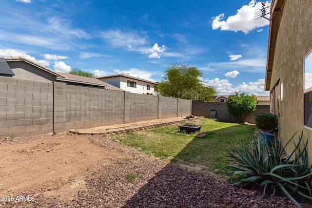 12814 W Indianola Ave, Avondale, AZ 85392 - view of yard with a fire pit and a fenced backyard