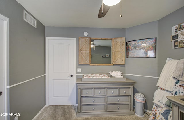 bathroom featuring visible vents, baseboards, ceiling fan, and vanity