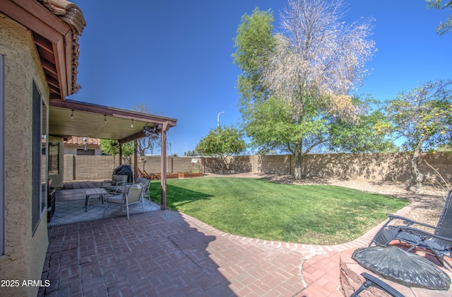 view of patio with a fenced backyard