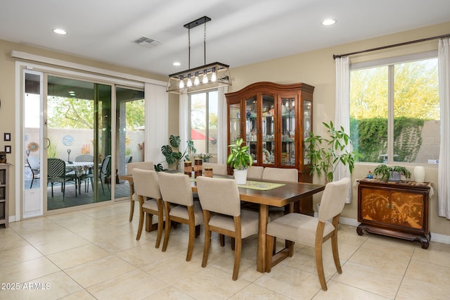dining space featuring visible vents, recessed lighting, and light tile patterned floors