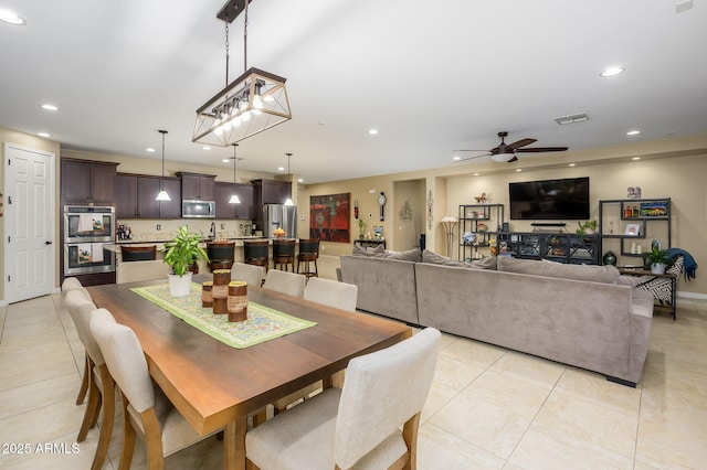 dining area featuring visible vents, recessed lighting, light tile patterned floors, and a ceiling fan