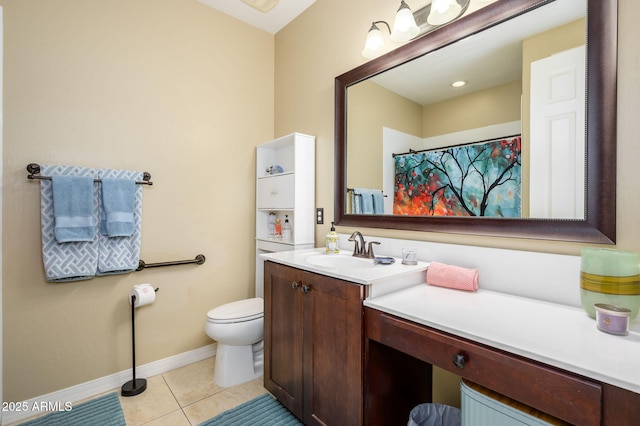 bathroom featuring vanity, a shower with curtain, tile patterned flooring, toilet, and baseboards