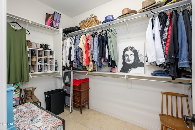 spacious closet with tile patterned flooring
