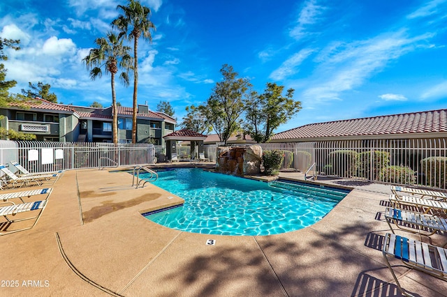 view of swimming pool featuring a gazebo and a patio area