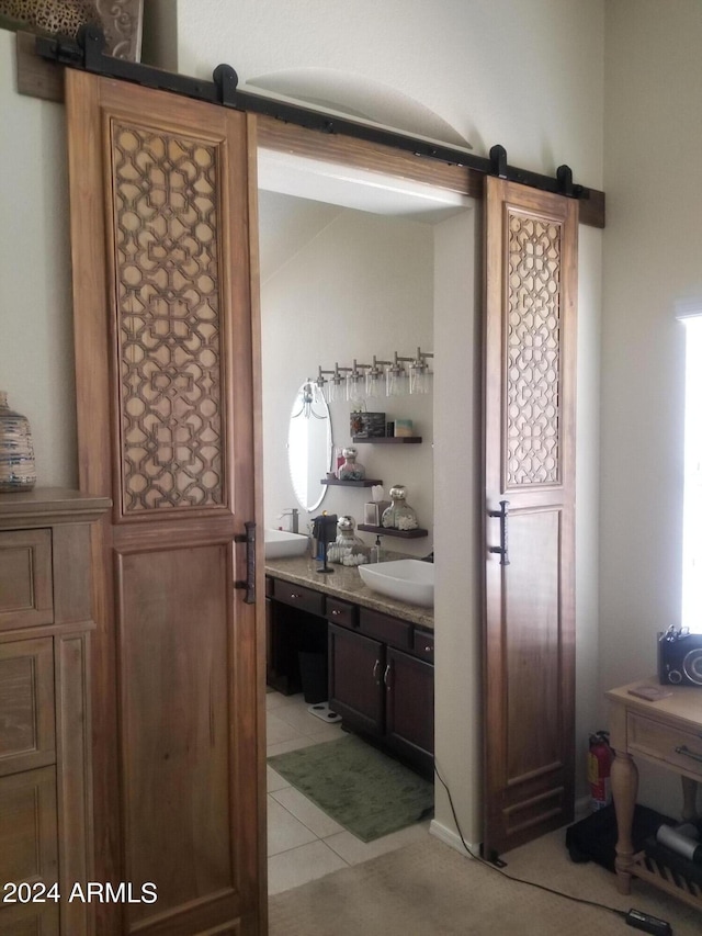 bathroom featuring vanity and tile patterned flooring