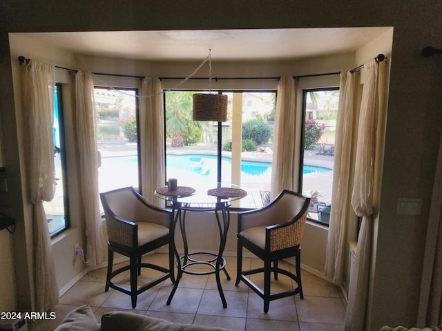 dining room featuring light tile patterned floors