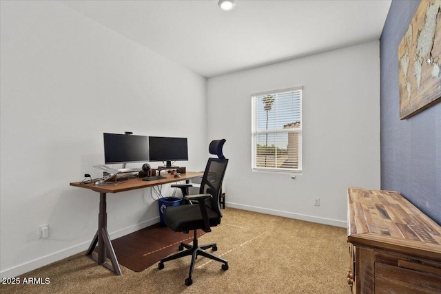carpeted office with baseboards