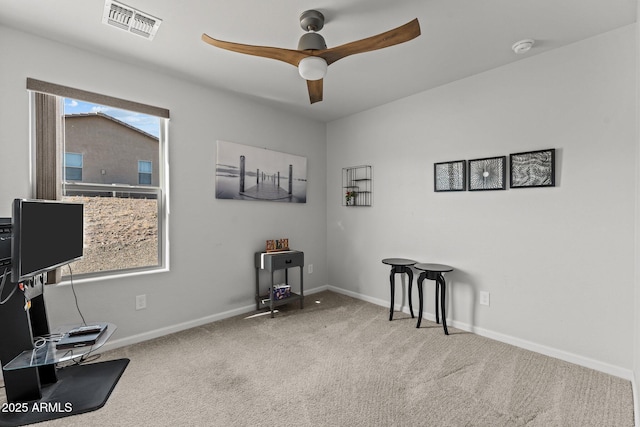 miscellaneous room with ceiling fan, plenty of natural light, and carpet flooring