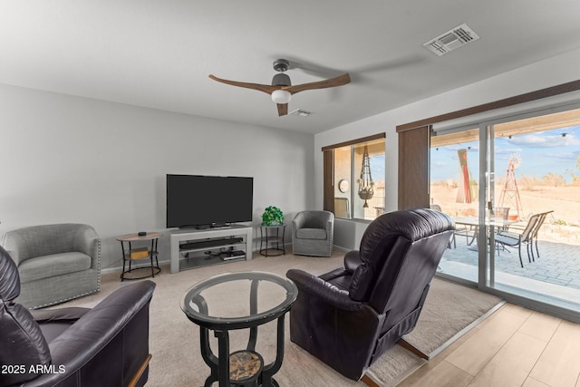 living room with ceiling fan