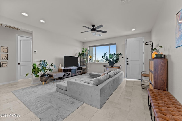 living area with baseboards, a ceiling fan, visible vents, and recessed lighting