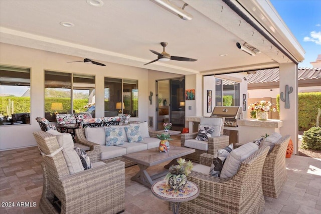 view of patio / terrace with outdoor lounge area and a grill