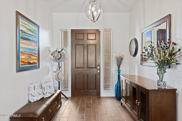 foyer featuring an inviting chandelier