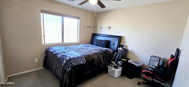 carpeted bedroom featuring a ceiling fan, visible vents, and baseboards