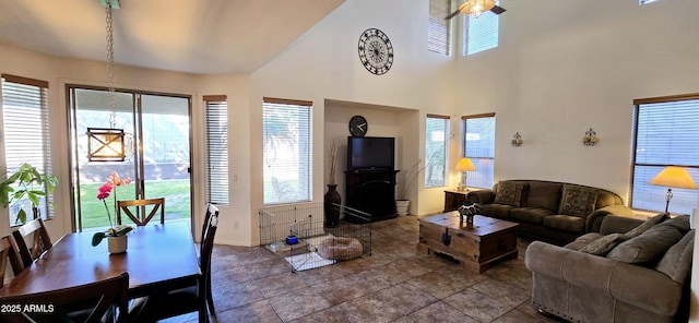 living room with a high ceiling