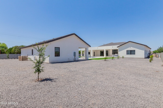 rear view of house with a patio area