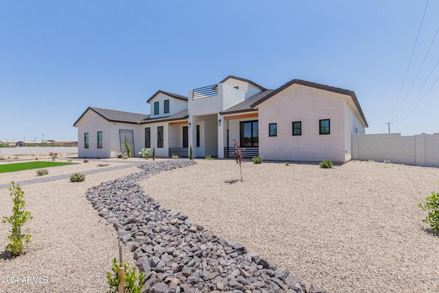 view of front of home featuring covered porch