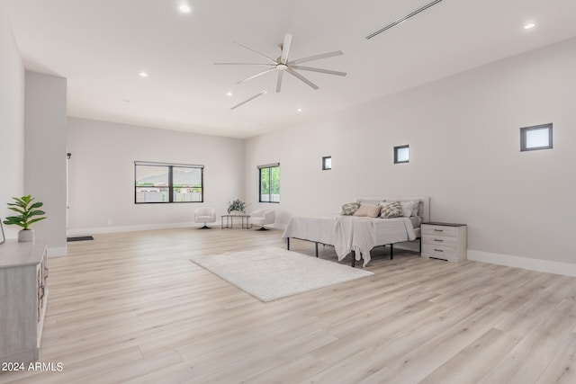 bedroom featuring light hardwood / wood-style flooring and ceiling fan