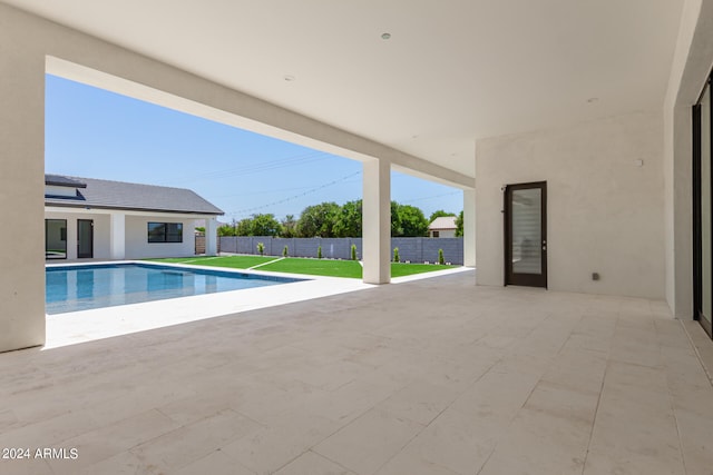 view of swimming pool featuring a patio