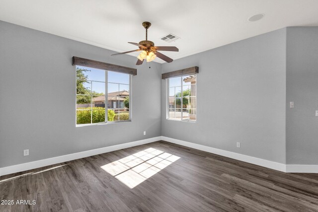 21616 E Calle De Flores, Queen Creek, AZ 85142 - empty room featuring visible vents, ceiling fan, dark wood-style flooring, and baseboards