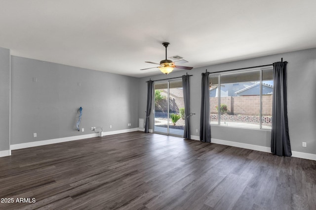 21616 E Calle De Flores, Queen Creek, AZ 85142 - empty room featuring visible vents, a ceiling fan, dark wood-style floors, and baseboards