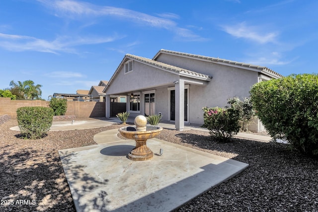 21616 E Calle De Flores, Queen Creek, AZ 85142 - back of property with fence, a patio area, and stucco siding