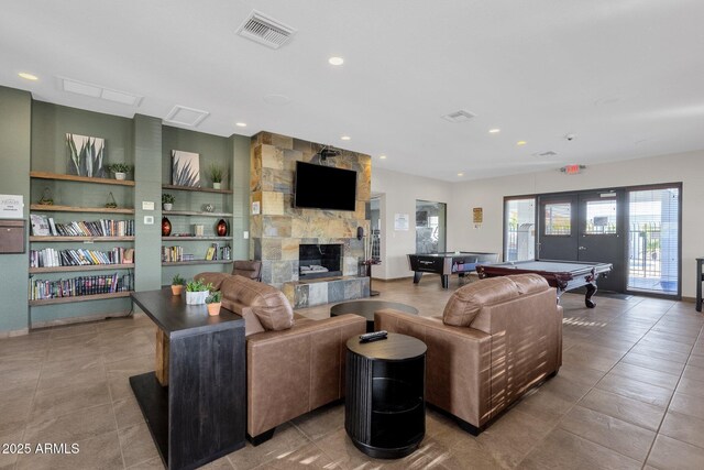 21616 E Calle De Flores, Queen Creek, AZ 85142 - living room featuring recessed lighting, pool table, tile patterned floors, a fireplace, and visible vents