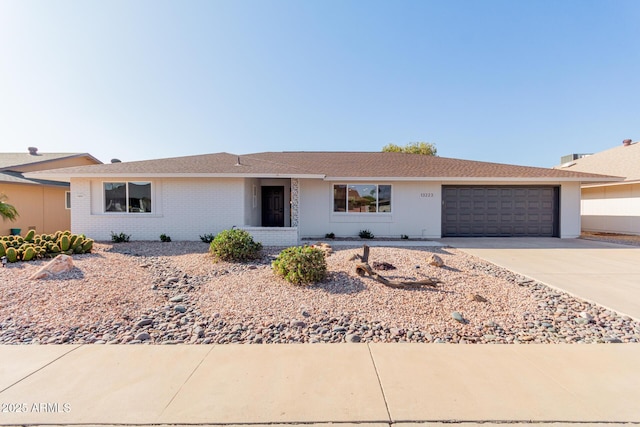 single story home with a garage