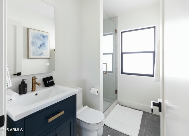 bathroom featuring walk in shower, vanity, and toilet