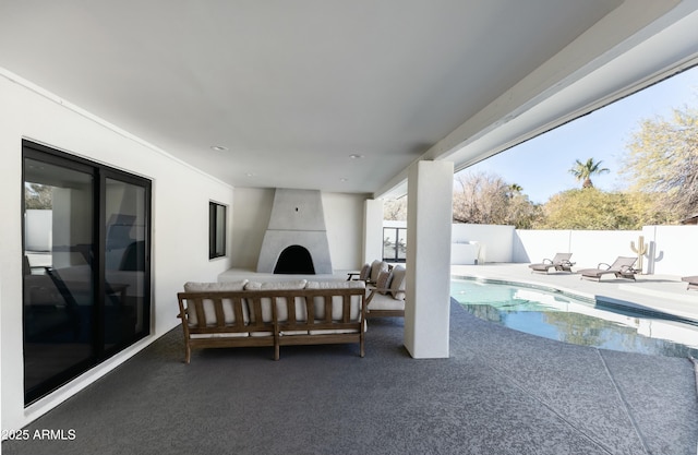 view of patio with a fenced in pool and an outdoor living space