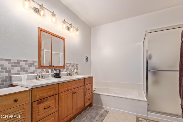 bathroom featuring separate shower and tub, decorative backsplash, tile patterned flooring, and vanity