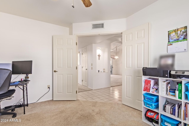 office with ceiling fan and light carpet