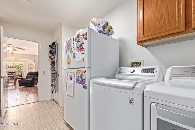 laundry area with cabinets, separate washer and dryer, and ceiling fan