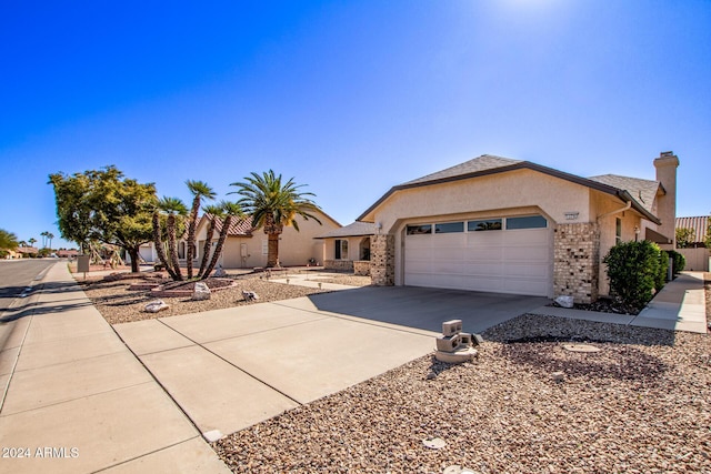 ranch-style home with a garage