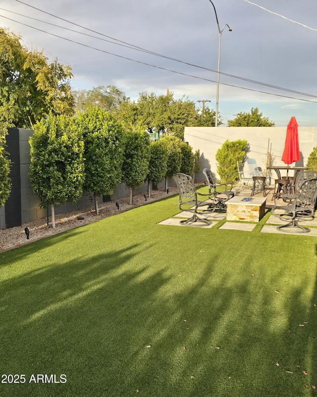 1954 E Nielson Ave, Mesa, AZ 85204 - view of yard featuring a fire pit and a patio area