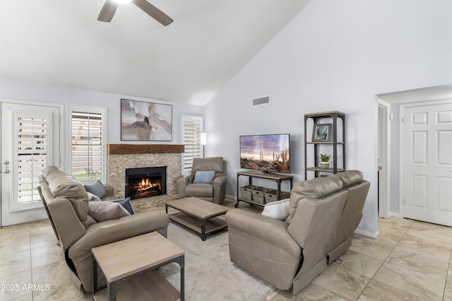 5755 W Harrison St, Chandler, AZ 85226 - living room featuring baseboards, visible vents, high vaulted ceiling, ceiling fan, and a stone fireplace