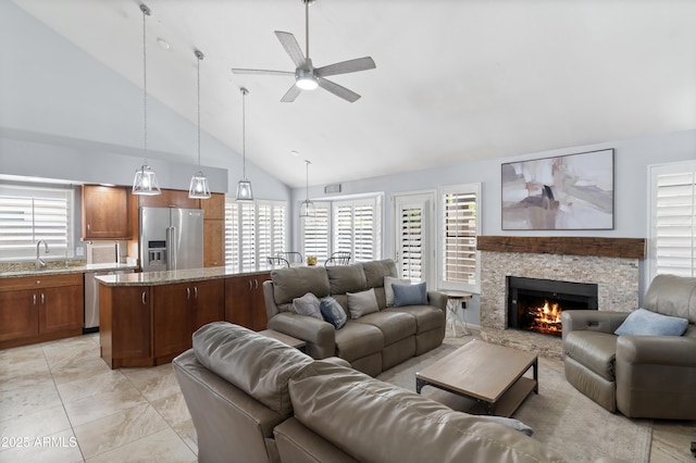 5755 W Harrison St, Chandler, AZ 85226 - living area featuring a fireplace, a ceiling fan, and high vaulted ceiling