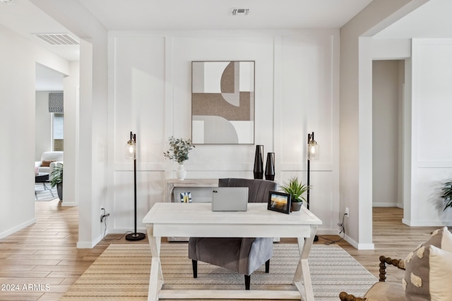 office space featuring light wood-type flooring