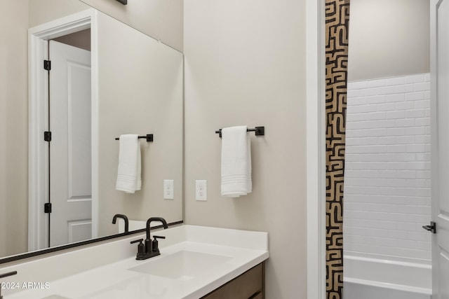 bathroom featuring vanity and shower / bath combo with shower curtain