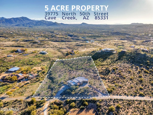 aerial view featuring a mountain view