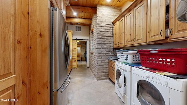 laundry area featuring cabinets, independent washer and dryer, and wood ceiling