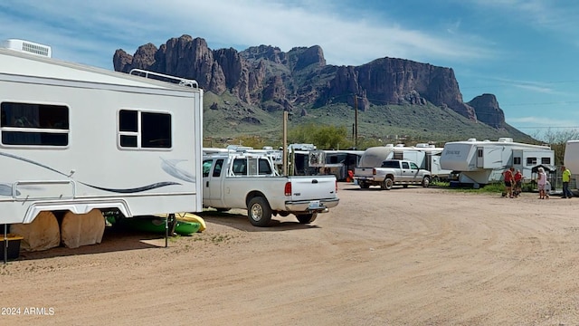 view of parking featuring a mountain view