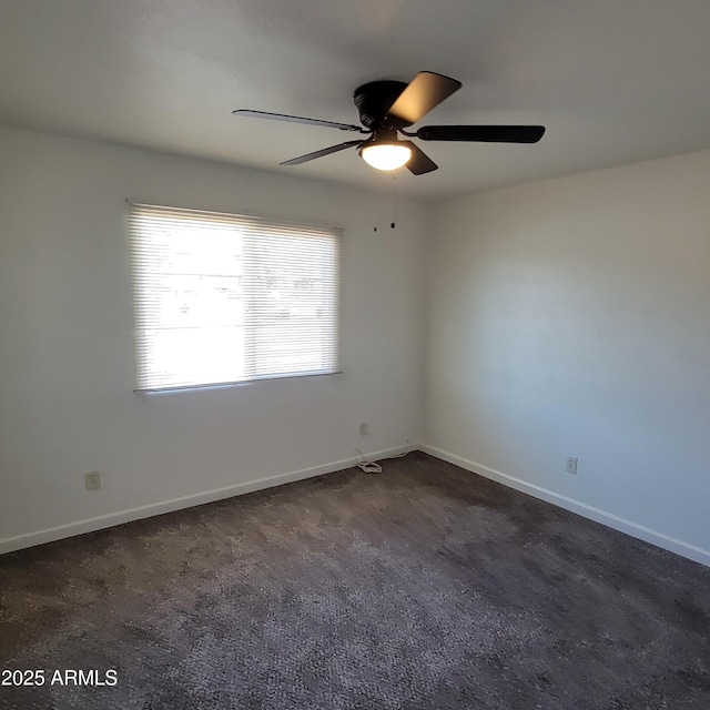 3645 N 69th Ave Unit 99, Phoenix, AZ 85033 - spare room with ceiling fan and baseboards
